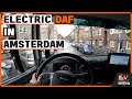 Electric DAF CF truck driving in Amsterdam