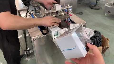 Automatic box cellophane over wrapping machine