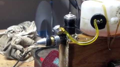 Cox Tee Dee .049 with exhaust throttle ring. Bench run