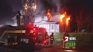 Firefighters battle house fire in Dayton