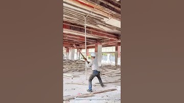 Workers dismantle formwork at construction sites