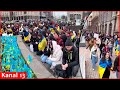 Residents commemorate those who died in the war in Kyiv’s Freedom Square