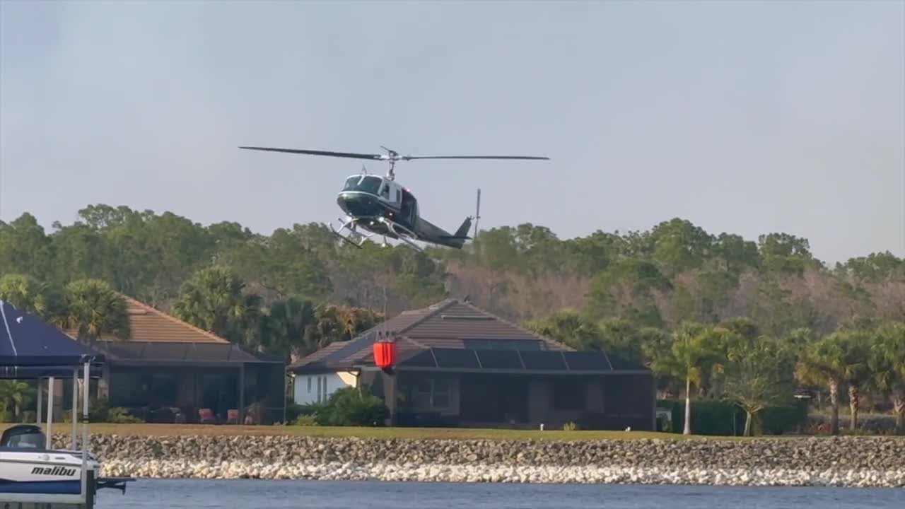 Brush fire burning in north Collier County completely contained, fire officials say