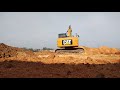 CATERPILLAR 313D2GC MOVENDO TERRA