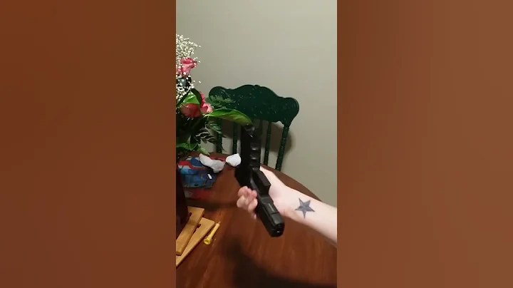 Chick assembles Glock 22 one handed