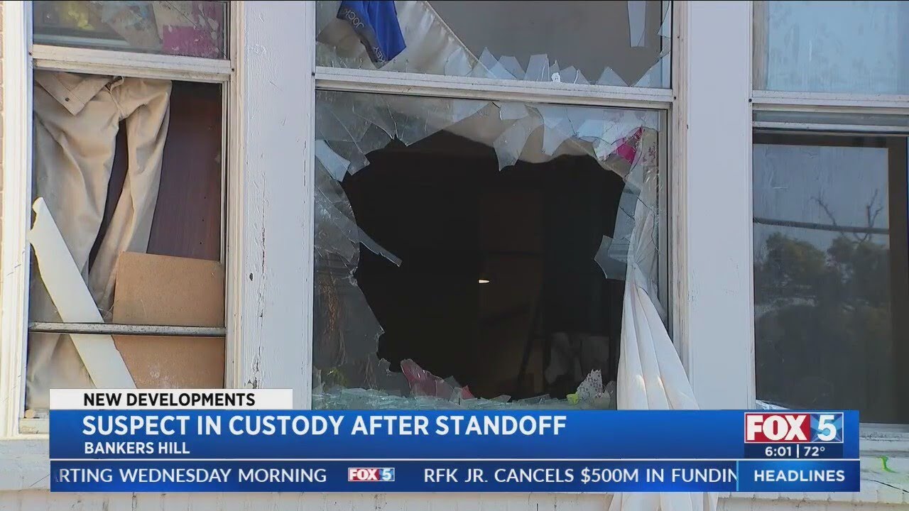 Man in custody after hours-long standoff in Bankers Hill - YouTube