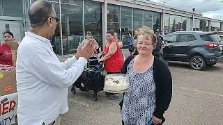 12 July 2025. Delton Canada Post Parking Edmonton.we Together Strong Community Food Distribution