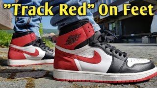 jordan 1 track red on feet