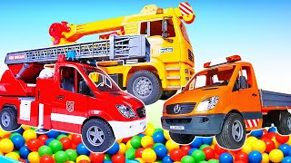 Pretend to play with toy street vehicles at the repair shop. Learning videos with cars and trucks.