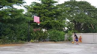 JD play basketball