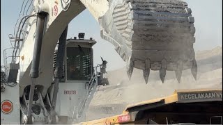 Big Bucket Liebherr 9350 Excavator Loading Overburden on OHT Cat 777D Caterpillar Dumper