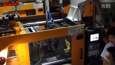 robot automatic mold embedding for charger - TOPSTAR