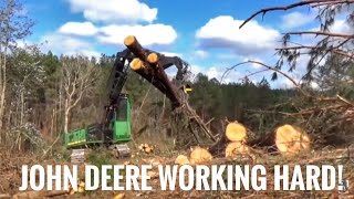 John Deere 2154d shoveling trees