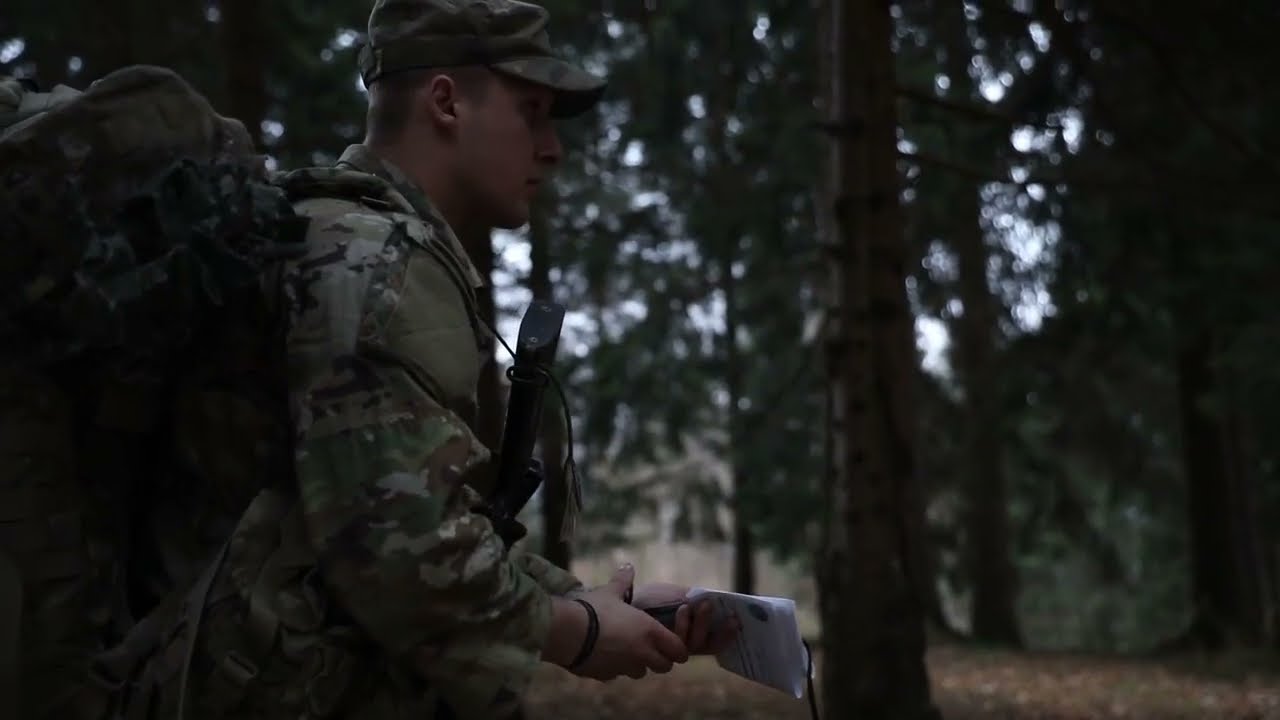 Soldiers maneuver through a land navigation course for the SETAF-AF Best Squad Competition
