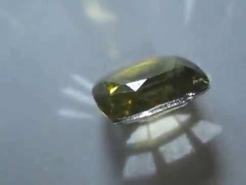 Batu Permata Natural Zircon Kuning Cushion Cut berat 2.42 carat. 