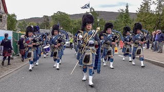 RAF Central Scotland Pipes & Drums parade through village to 2018 Braemar Gathering Highland Games