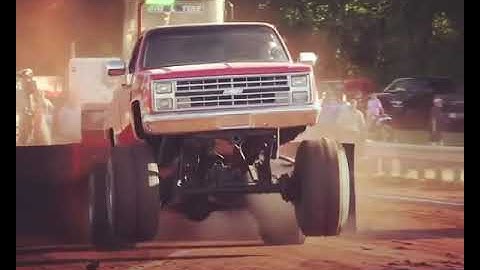 85 Chevy pullin with bead locked 44” Boggers on toploaders