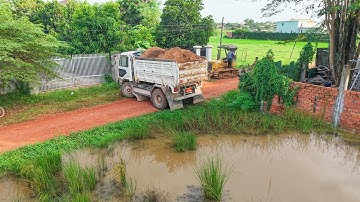 Incredible!! Start Dump Truck Dumping Soil Make new road by Dozer Pouring Soil with dump truck