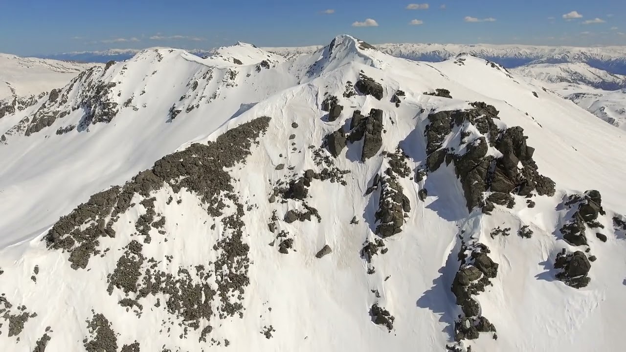 aerial view of the snowy peaks of the ural mountain range in siberia russia SBV 347579384 HD