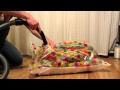 packing an eiderdown (quilt) into vacuum bag using vacuum cleaner [HD]