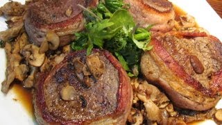 Chef pete cooks up some bacon wrapped beef tenderloin medallions and
serves them with sauteed mushrooms a super easy pan sauce.