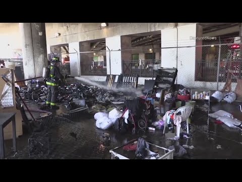 After fire destroys North Side homeless encampment, residents say someone started it