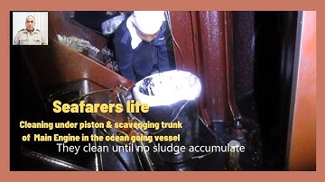 Cleaning the under piston & scavenging trunk of Main Engine in the ocean going vessel.