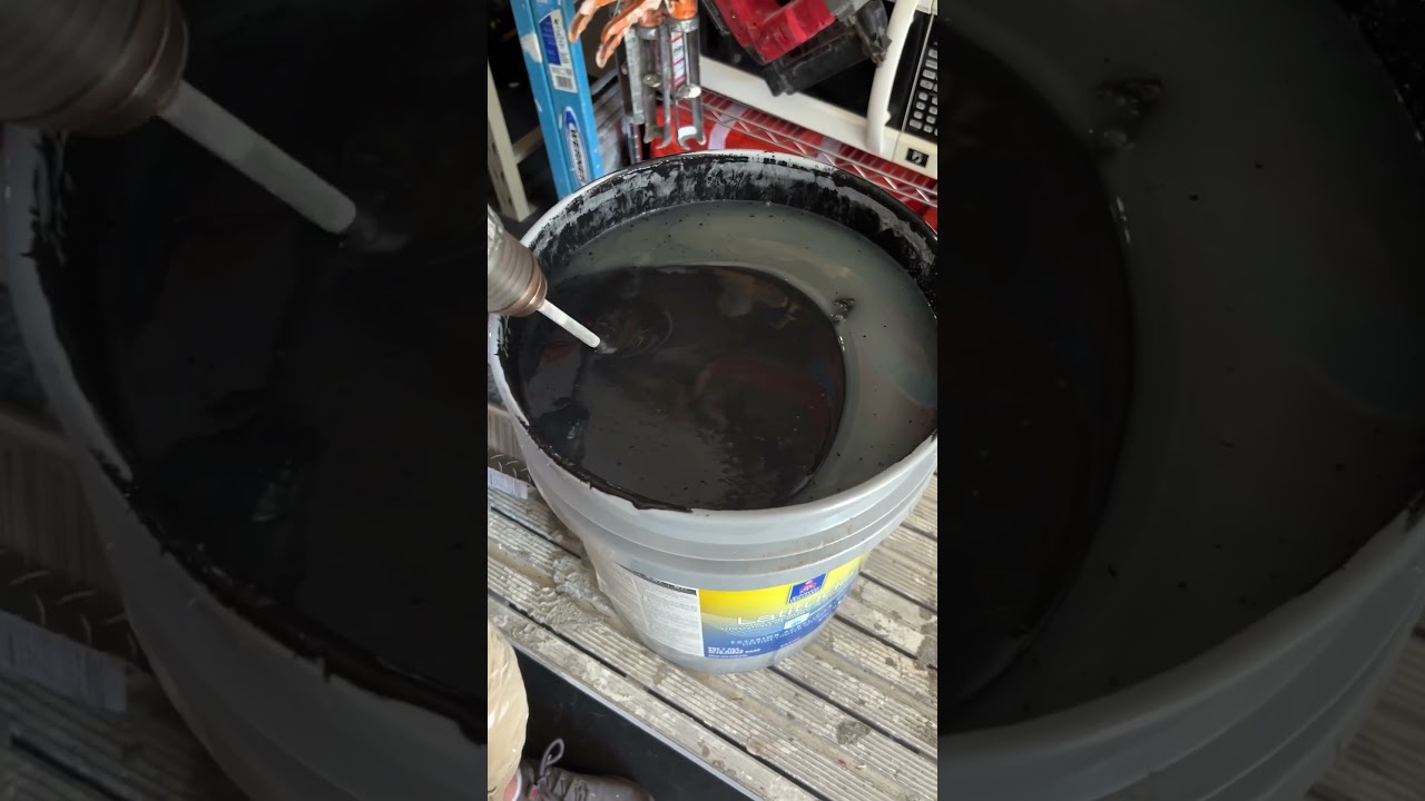 Mixing 5gal bucket of paint 