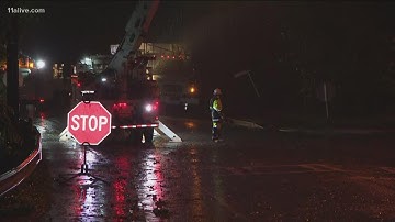 Crews work in area where tree fell down on power line