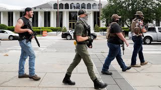 Armed group gathers and walks through downtown Raleigh