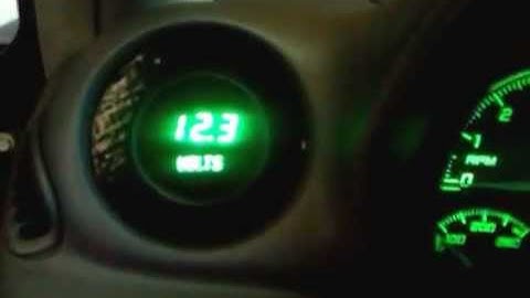 Intellitronix Green LED Digital Volt Gauge mounted in 01 Pontiac GAGT