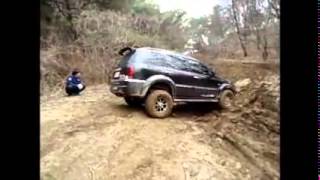 Ssangyong Rexton off-road 4x4 mud mire fight desperately Ssangyong Rexton off-road 4x4 mud mire fight desperately