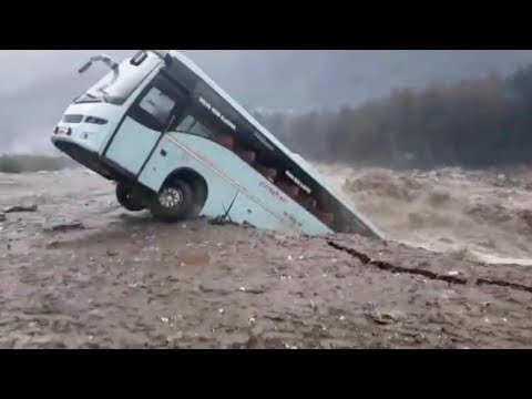 Bus swept away by floods in northern India