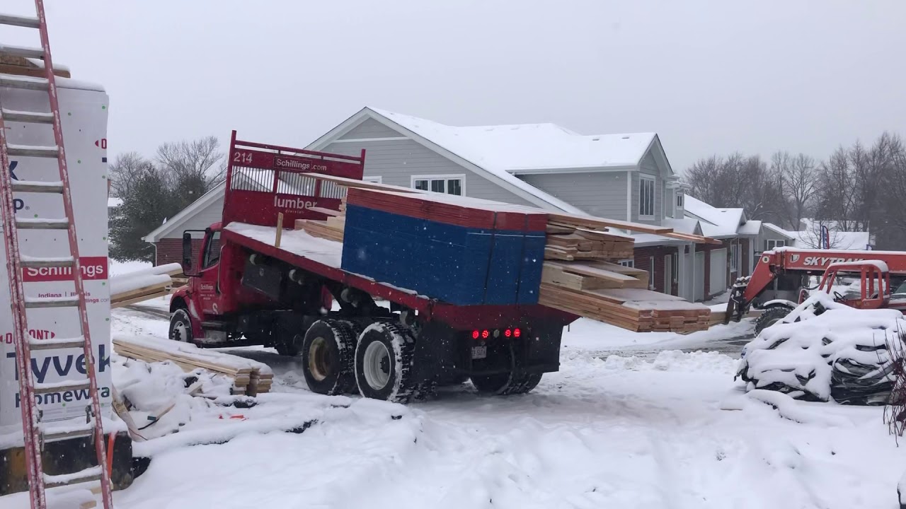 Lumber stuck frozen to the flatbed lumber dump part 1 YouTube