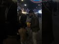 توزيع الحلوى جكليت بمناسبة مولد علي الاكبر في الكاظمية