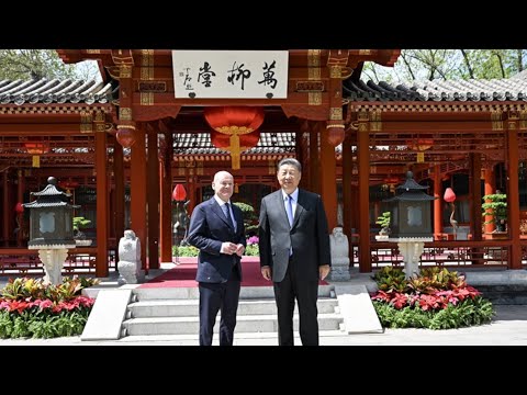 Xi Jinping, Olaf Scholz walk and talk in the garden of Diaoyutai State Guesthouse, Beijing