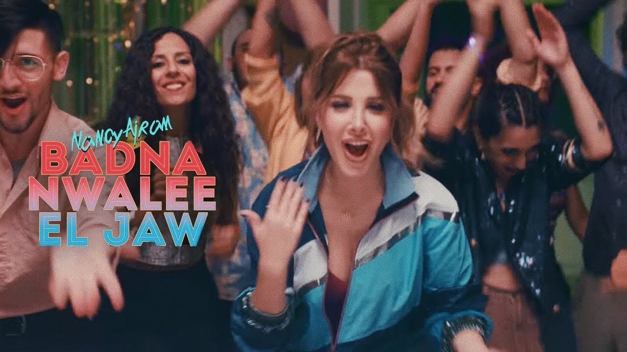 Nancy Ajram   Badna Nwalee El Jaw Official Music Video       