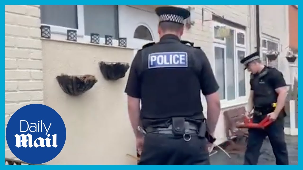 Police launch gun raids in Liverpool after three killings