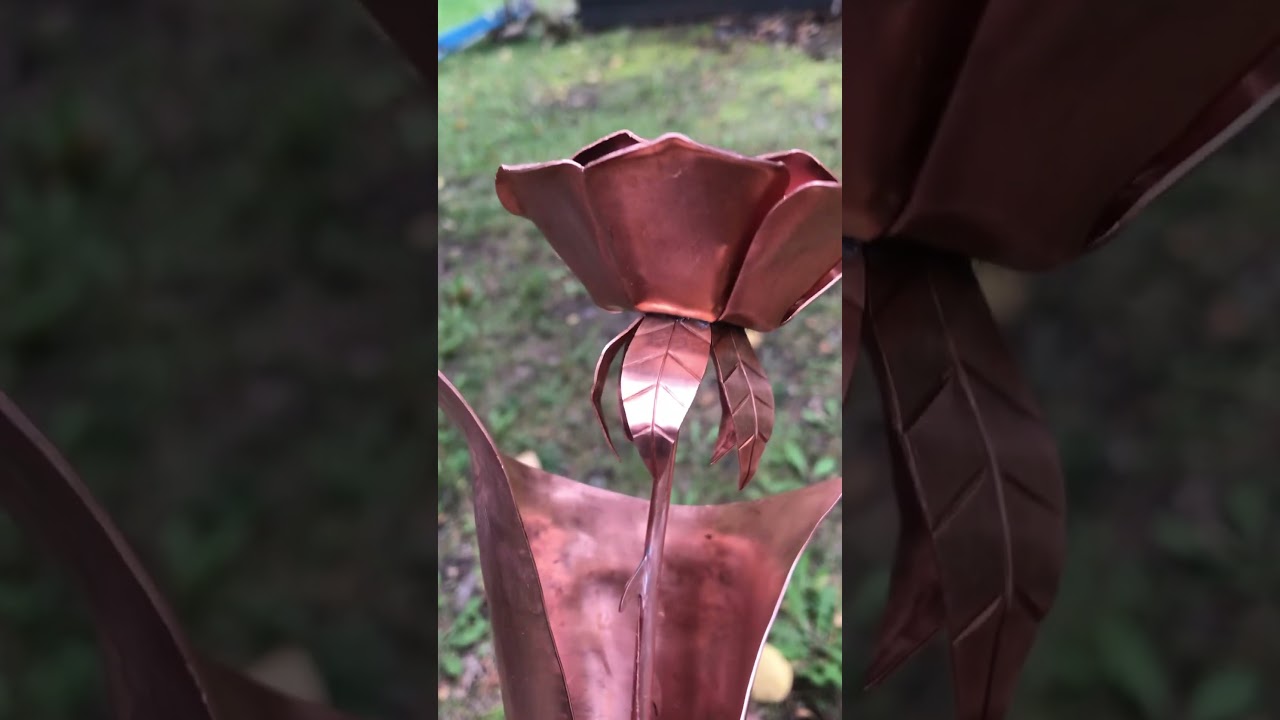 Copper rose in copper vase 
