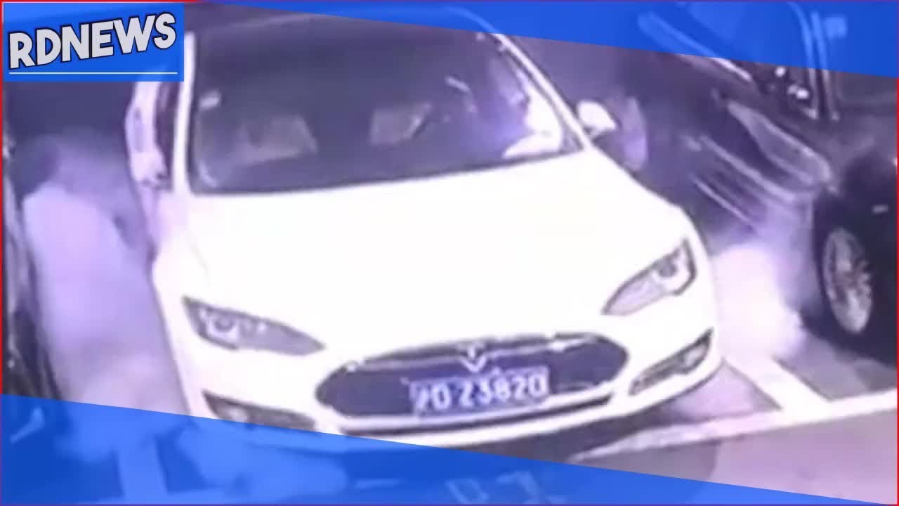 Parked Tesla bursts into flames after smoke seen coming from underneath ...