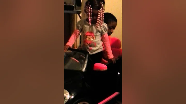 Khloe listening to the radio in her new car!