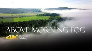 4K Drone Footage Above Foggy Landscape in Norway