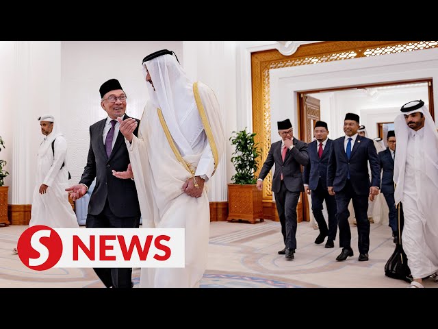 Anwar accorded official welcome in Qatar class=