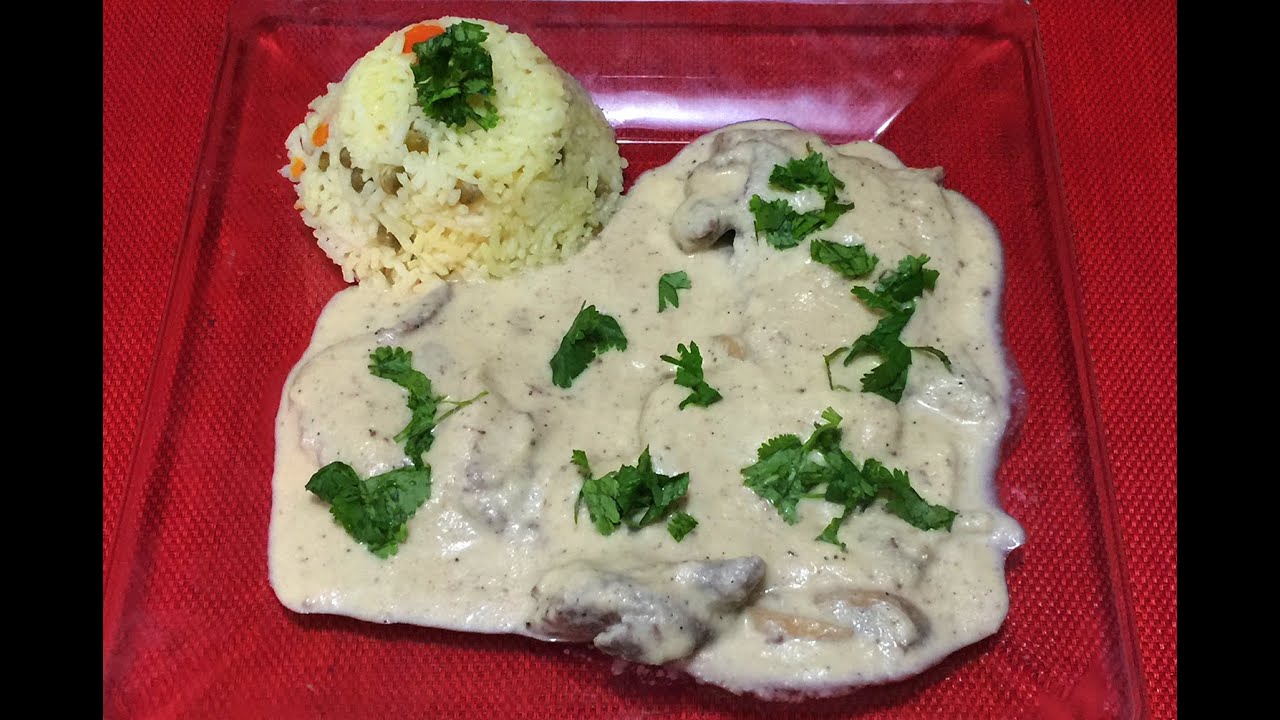 Bisteck En salsa Blanca Con Arroz Blanco