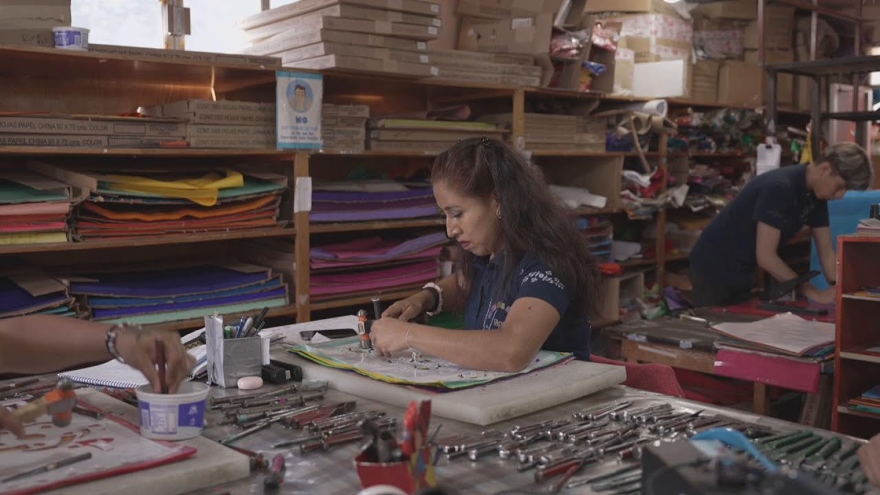 In Mexico, paper cut-out decorations welcome back the dead
