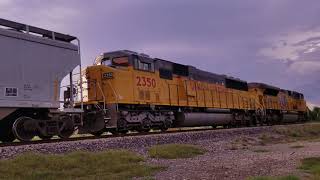 Up 4951 with leaser units and 8916 with a SD60M Triclops at the Kyle siding