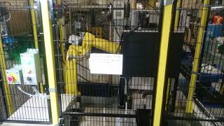 Robotic integration with laser engraving station