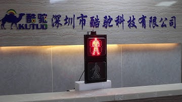 Square pedestrian traffic light with yellow countdown timer