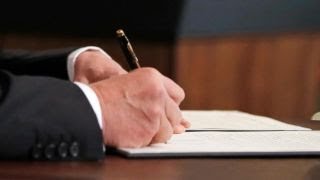 Trump signs two-week spending bill to avoid shutdown