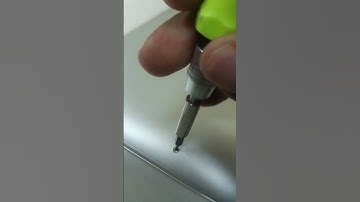 Stuck screw in a Macbook Pro